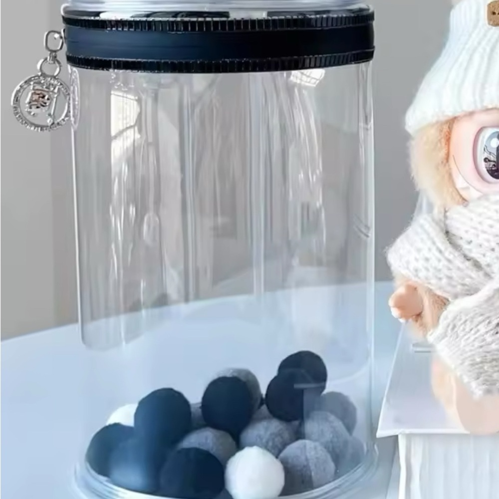 Clear labubu HOLDER with Black and White Pom Poms
